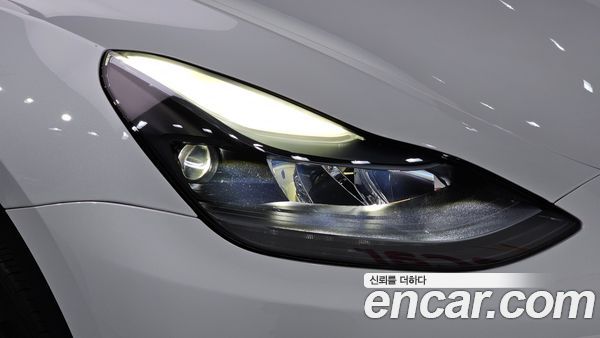 Tesla Model Y 2024, фото 7