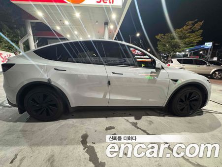 Tesla Model Y 2025, фото 7