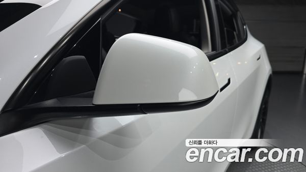 Tesla Model Y 2024, фото 29