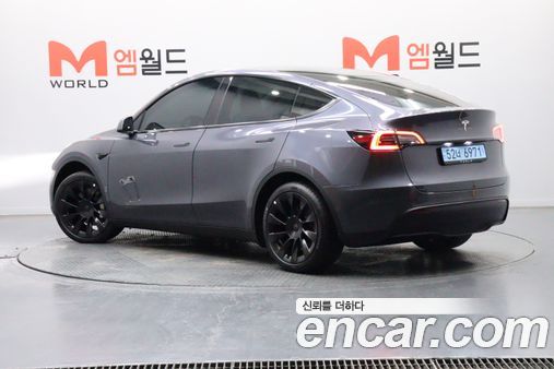 Tesla Model Y 2024, фото 5